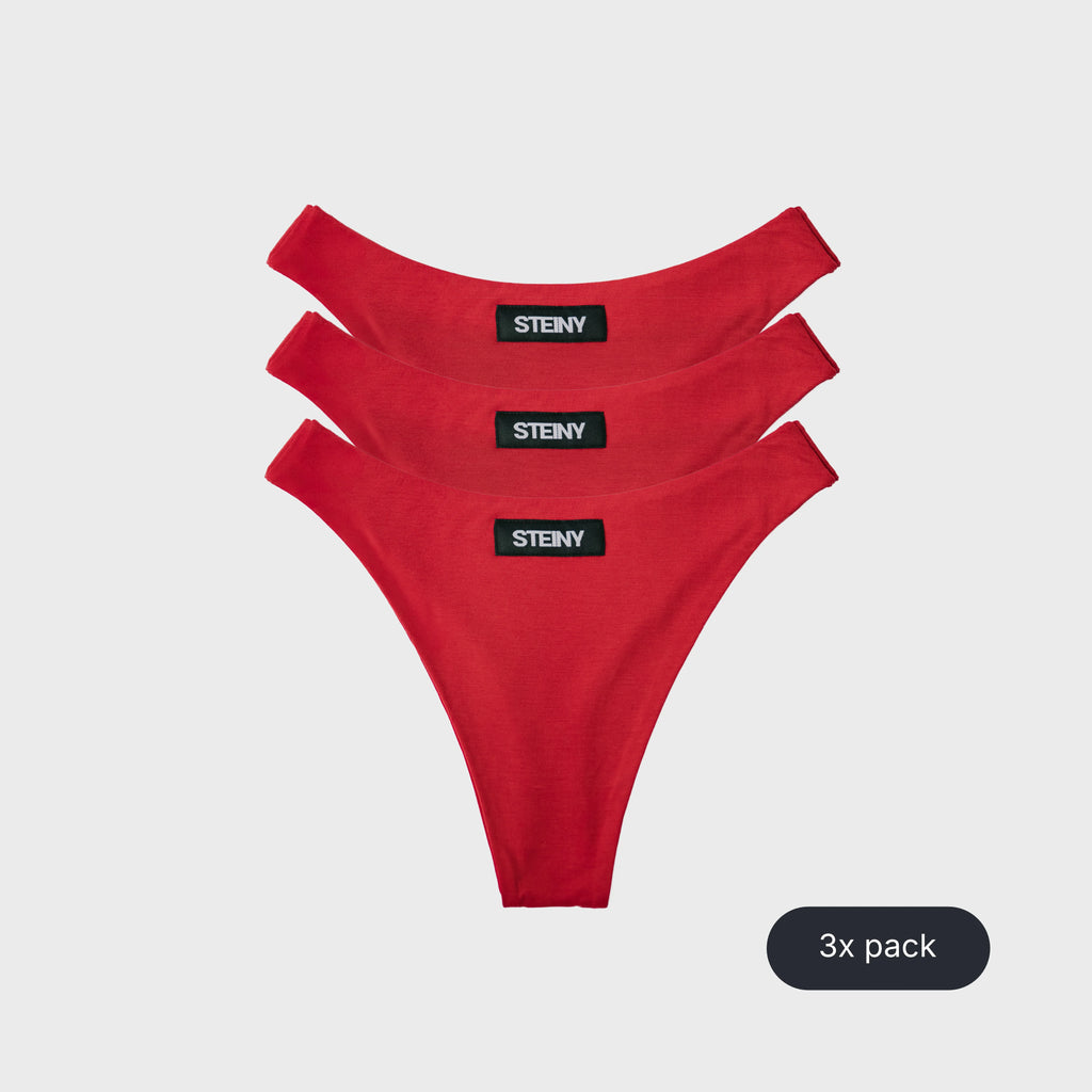 Three fiery red STEINY Underwear high-waisted thongs made of bamboo